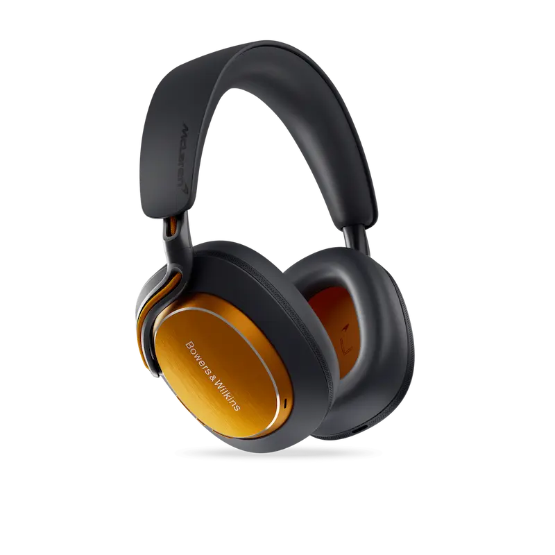 Casque audio noir et orange sur fond transparent.
